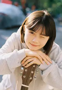 Discover Xin Yue's Captivating Youthful Charm with Guitar in the YiTuYu Vol.8587 Collection.-0