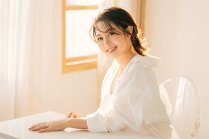 Captivating Female Portrait Bathed in Radiant Morning Sunlight, Embracing Natural Beauty 1000018680-2