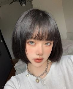 Adorable Girl with Blunt Bangs & Short Hair - Youthful & Charming Style Photo-0