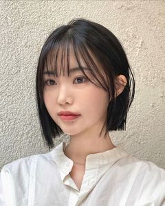 Adorable Girl with Blunt Bangs & Short Hair - Youthful & Charming Style Photo-2