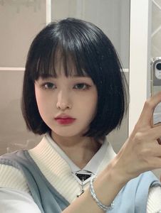 Adorable Girl with Blunt Bangs & Short Hair - Youthful & Charming Style Photo-6