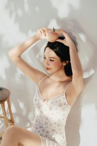 Beautiful Woman Enjoying Fresh Summer Peaches in a Lush Garden Setting, Healthy Lifestyle Inspiration.-6