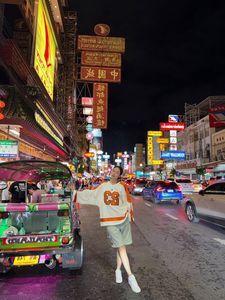 Miss Thanh Thuy's Dynamic Gen Z Style in Thailand: Chic Polo Dress Street Style-5