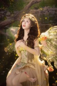 Discover Ethereal Beauty: Fairy Cosplay Amidst Sparkling Forest Lights-1