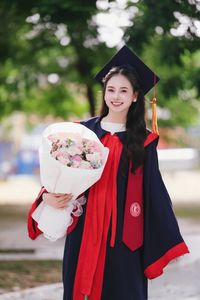 Beautiful Female Graduate Embraces Success at Graduation Ceremony-10