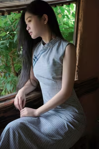 XVG No.43: Discover the captivating elegance of an Asian young woman in a pensive moment by the window.-0
