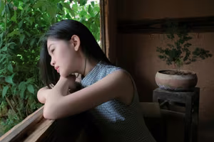 XVG No.43: Discover the captivating elegance of an Asian young woman in a pensive moment by the window.-6