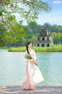 Gentle Beauty of Vietnamese Woman in Traditional Ao Dai at Hoan Kiem Lake-6