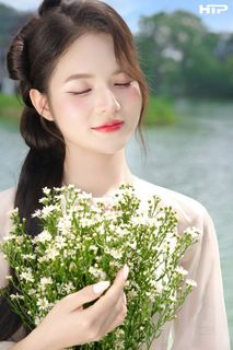 Gentle Beauty of Vietnamese Woman in Traditional Ao Dai at Hoan Kiem Lake-3