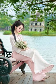 Gentle Beauty of Vietnamese Woman in Traditional Ao Dai at Hoan Kiem Lake-1