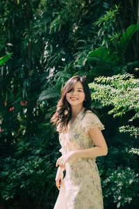 XVG No.48: A Beautiful Girl's Peaceful Moment in a Green Garden, Her Radiant Smile Reflecting Natural Beauty.-2