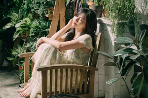 XVG No.48: A Beautiful Girl's Peaceful Moment in a Green Garden, Her Radiant Smile Reflecting Natural Beauty.-3