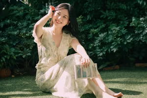 XVG No.48: A Beautiful Girl's Peaceful Moment in a Green Garden, Her Radiant Smile Reflecting Natural Beauty.-0