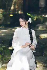 Charming Young Woman in White Lace & Orchids: Radiant Natural Beauty Amidst Greenery 1000026906-0