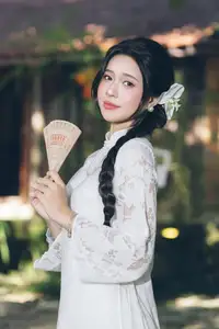 Charming Young Woman in White Lace & Orchids: Radiant Natural Beauty Amidst Greenery 1000026906-16