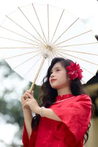 Graceful Vietnamese Beauty: Traditional Ao Dai Adorned with a Vibrant Red Flower-6