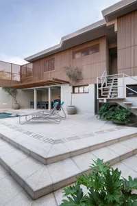 Modern Transformation of a 1960s São Paulo Villa: Blending Original Structure with Contemporary Brazilian Wood Design for Cozy Open Living-25