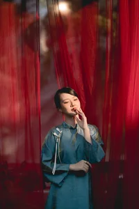 Classic Elegance: Vietnamese Tradition in Blue Silk and Pink Lilies-3