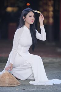 Elegant Vietnamese Girl in Traditional White Ao Dai - Timeless Beauty-23