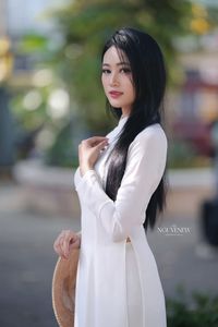 Elegant Vietnamese Girl in Traditional White Ao Dai - Timeless Beauty-17
