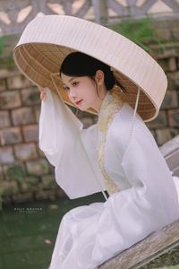 The Elegant Beauty of Vietnamese Women in Traditional Attire, A Symbol of Enduring Culture-0