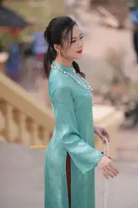 Captivating Charm: Vietnamese Girl's Elegance in a Stunning Mint Green Ao Dai-18