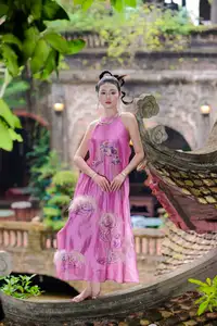 Timeless Grace: Vietnamese Woman's Modern Elegance Amidst Ancient Architecture.-6
