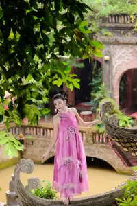 Timeless Grace: Vietnamese Woman's Modern Elegance Amidst Ancient Architecture.-10