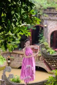 Timeless Grace: Vietnamese Woman's Modern Elegance Amidst Ancient Architecture.-8