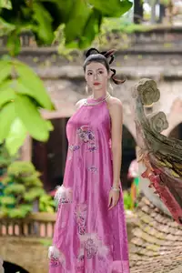 Timeless Grace: Vietnamese Woman's Modern Elegance Amidst Ancient Architecture.-9