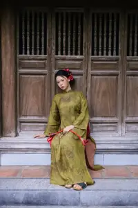 Graceful Vietnamese Ao Dai: Traditional Beauty Adorned with Red Calla Lilies-11