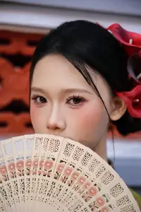 Graceful Vietnamese Ao Dai: Traditional Beauty Adorned with Red Calla Lilies-12