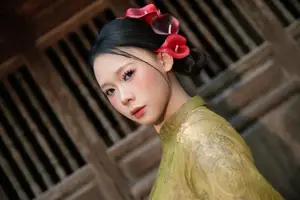 Graceful Vietnamese Ao Dai: Traditional Beauty Adorned with Red Calla Lilies-1