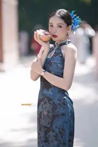 Captivating Asian Beauty: Elegant Woman in Blue Cheongsam with Traditional Fan-12