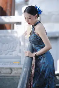 Captivating Asian Beauty: Elegant Woman in Blue Cheongsam with Traditional Fan-6