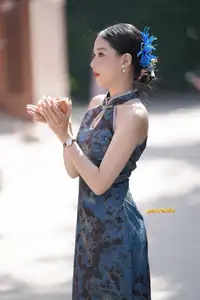 Captivating Asian Beauty: Elegant Woman in Blue Cheongsam with Traditional Fan-10