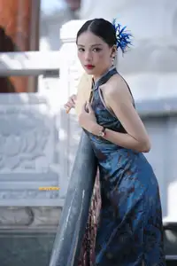 Captivating Asian Beauty: Elegant Woman in Blue Cheongsam with Traditional Fan-4