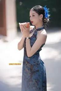 Captivating Asian Beauty: Elegant Woman in Blue Cheongsam with Traditional Fan-8