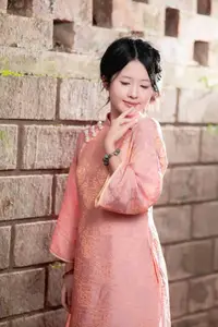 Graceful Asian Young Woman in Traditional Pink Attire: Timeless Beauty by an Ancient Wall-2