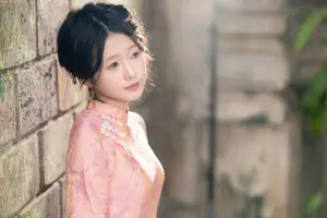 Graceful Asian Young Woman in Traditional Pink Attire: Timeless Beauty by an Ancient Wall-4