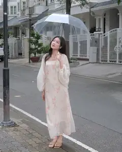 Girl in Floral Off-Shoulder Dress, Clear Umbrella: Fresh Summer Street Style-1