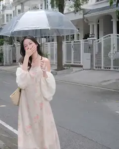 Girl in Floral Off-Shoulder Dress, Clear Umbrella: Fresh Summer Street Style-0