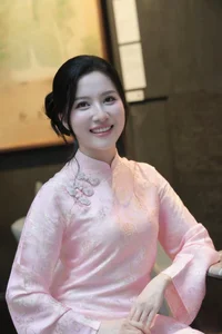 Elegant White Silk Vietnamese Ao Dai with Hand-Embroidered Lilies - Luxurious Traditional Dress for Weddings and Formal Events-0