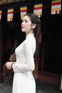 Elegant White Ao Dai: Capturing Graceful Vietnamese Traditional Beauty with a Radiant Smile-3