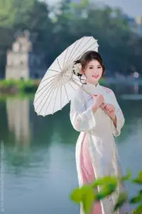 Enchanting East Asian Beauty: A Serene Muse in White Cheongsam under Soft Sunlight by the Lake.-4
