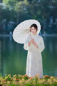 Enchanting East Asian Beauty: A Serene Muse in White Cheongsam under Soft Sunlight by the Lake.-2