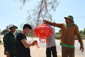 Vibrant Tet Traditions: Discover the Colorful Lunar New Year Bamboo Poles (Cay Neu) Along the Scenic Roads of Gia Lai, Vietnam-0