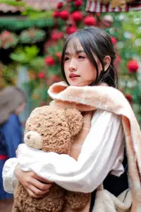 Cozy Christmas Reading: Young Woman and 'How to Win Friends' Book-1