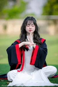 Graceful Vietnamese Girl in Elegant White Ao Dai with Sweet Finger Heart Gesture-5
