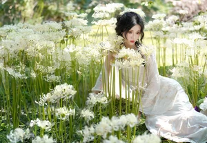 Ethereal Beauty in a White Flower Field: A Muse Under the Sun-4